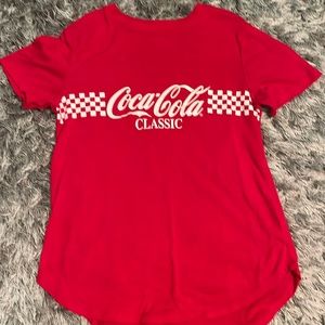 Previously used. Full red t-shirt. Women’s small.